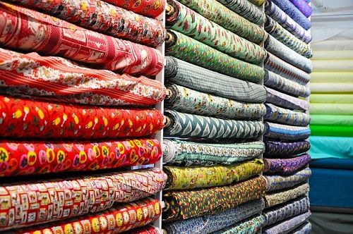 Customer selecting quality fabric